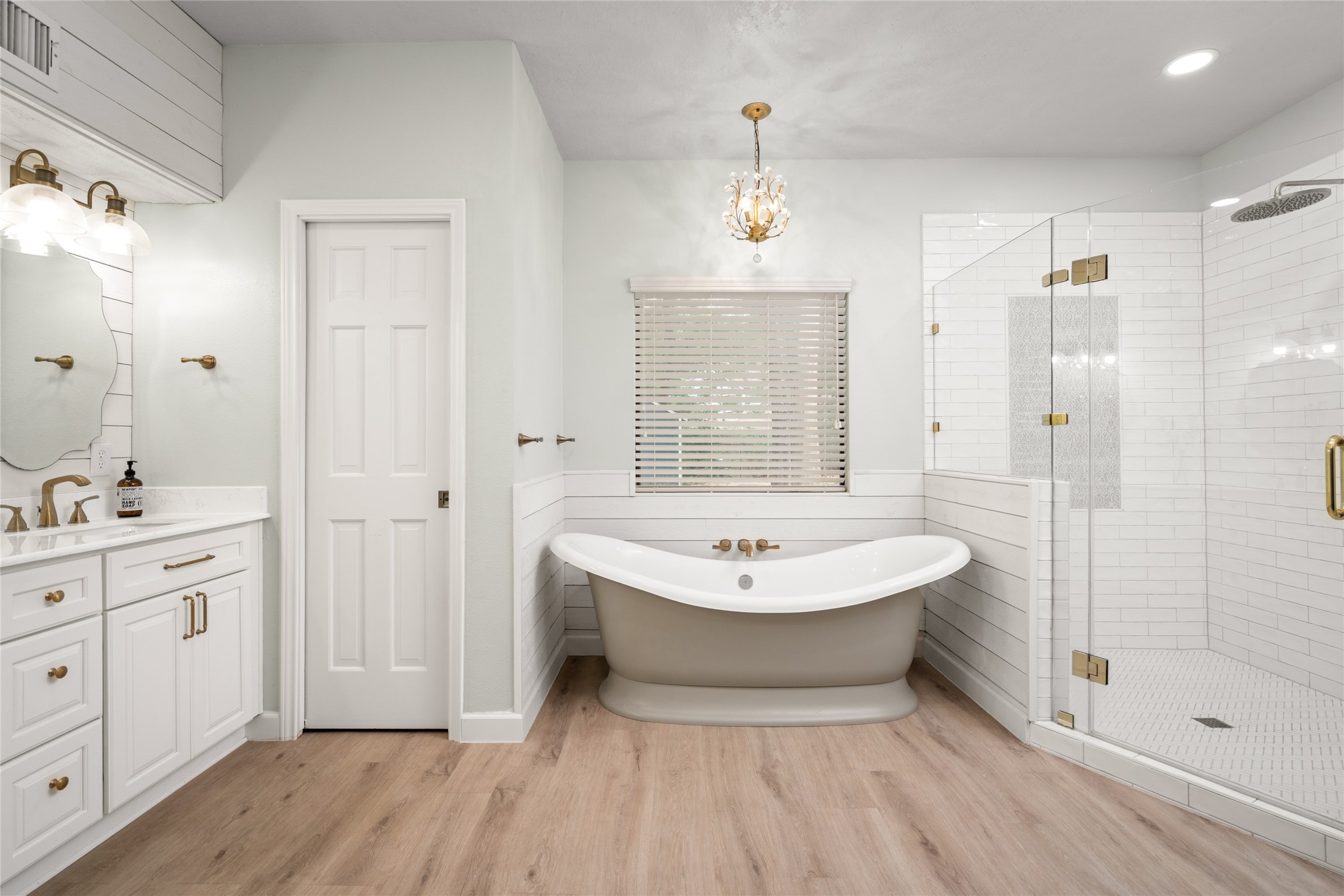 77 South Placid Hill Circle Spring, TX 77381 - Photo 22 of 48 Luxurious spa-inspired primary bath featuring a freestanding soaking tub, oversized custom shower, designer finishes, and high-end Ferguson fixtures.