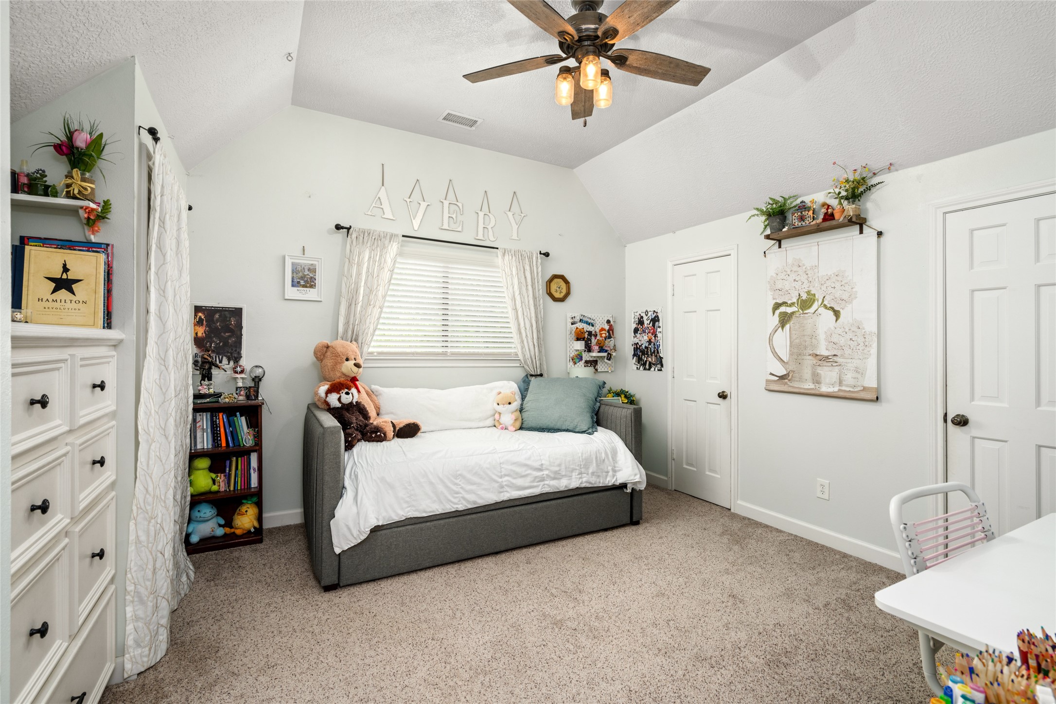 77 South Placid Hill Circle Spring, TX 77381 - Photo 26 of 48 Upstairs secondary bedroom with tall ceilings, custom built-ins, and dual closets.