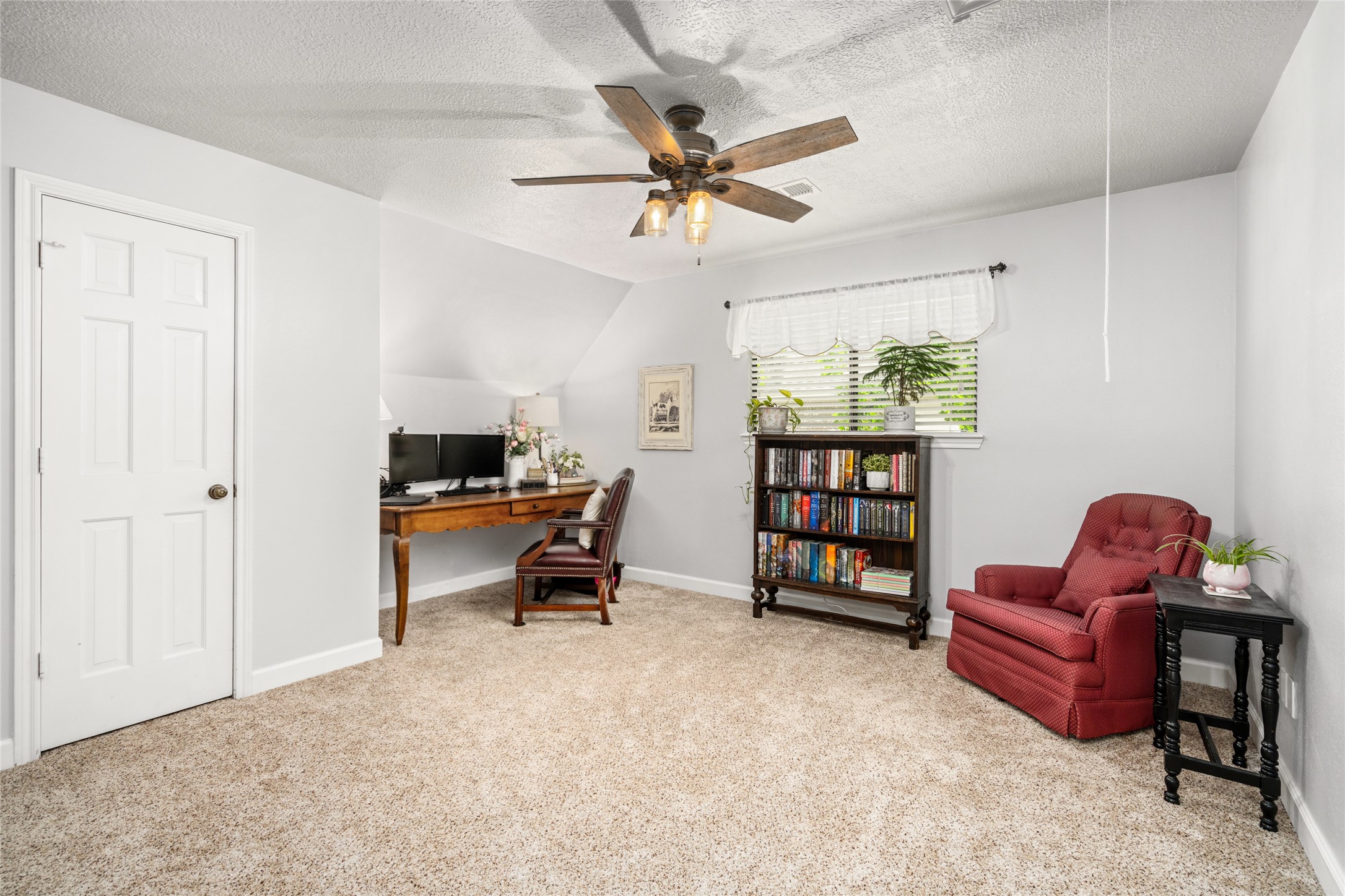 77 South Placid Hill Circle Spring, TX 77381 - Photo 28 of 48 Spacious 4th bedroom upstairs with new carpet and custom built-ins.