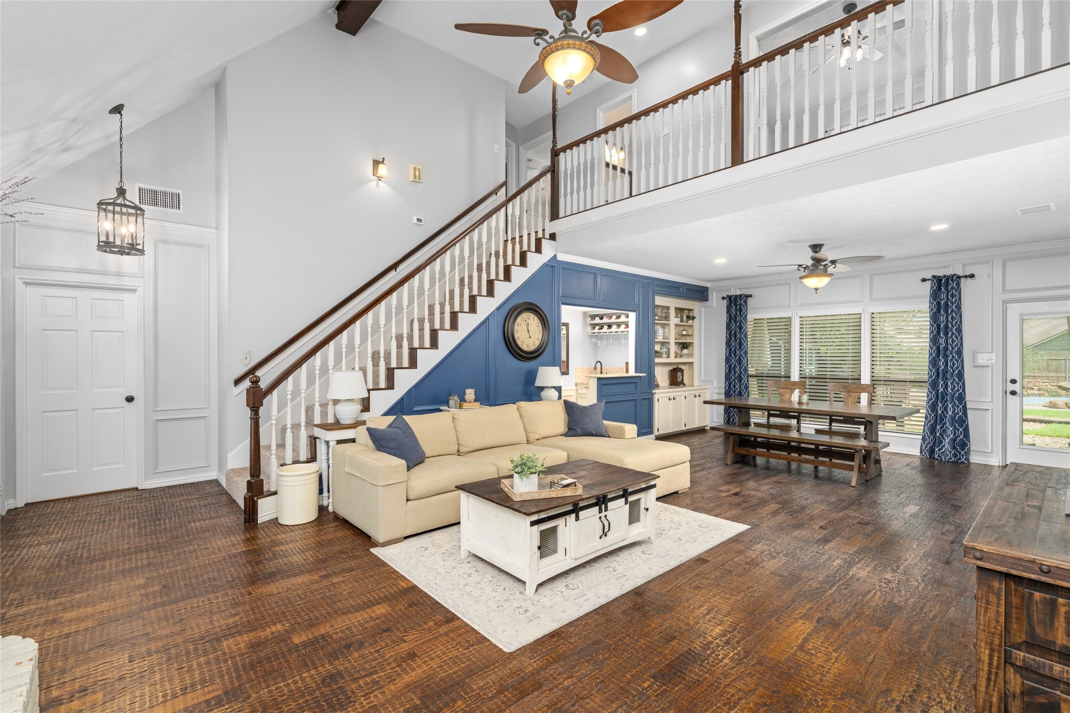 77 South Placid Hill Circle Spring, TX 77381 - Photo 3 of 48 A dramatic two-story living room that is open to the upper level.