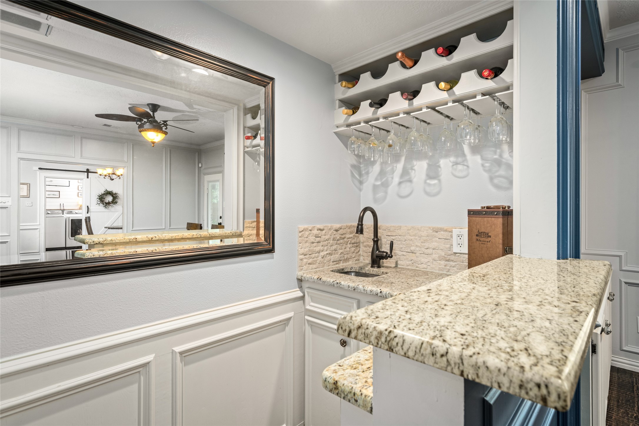 77 South Placid Hill Circle Spring, TX 77381 - Photo 32 of 48
Custom wet bar with granite countertops, wine storage, and built in glass racks perfect for entertaining.