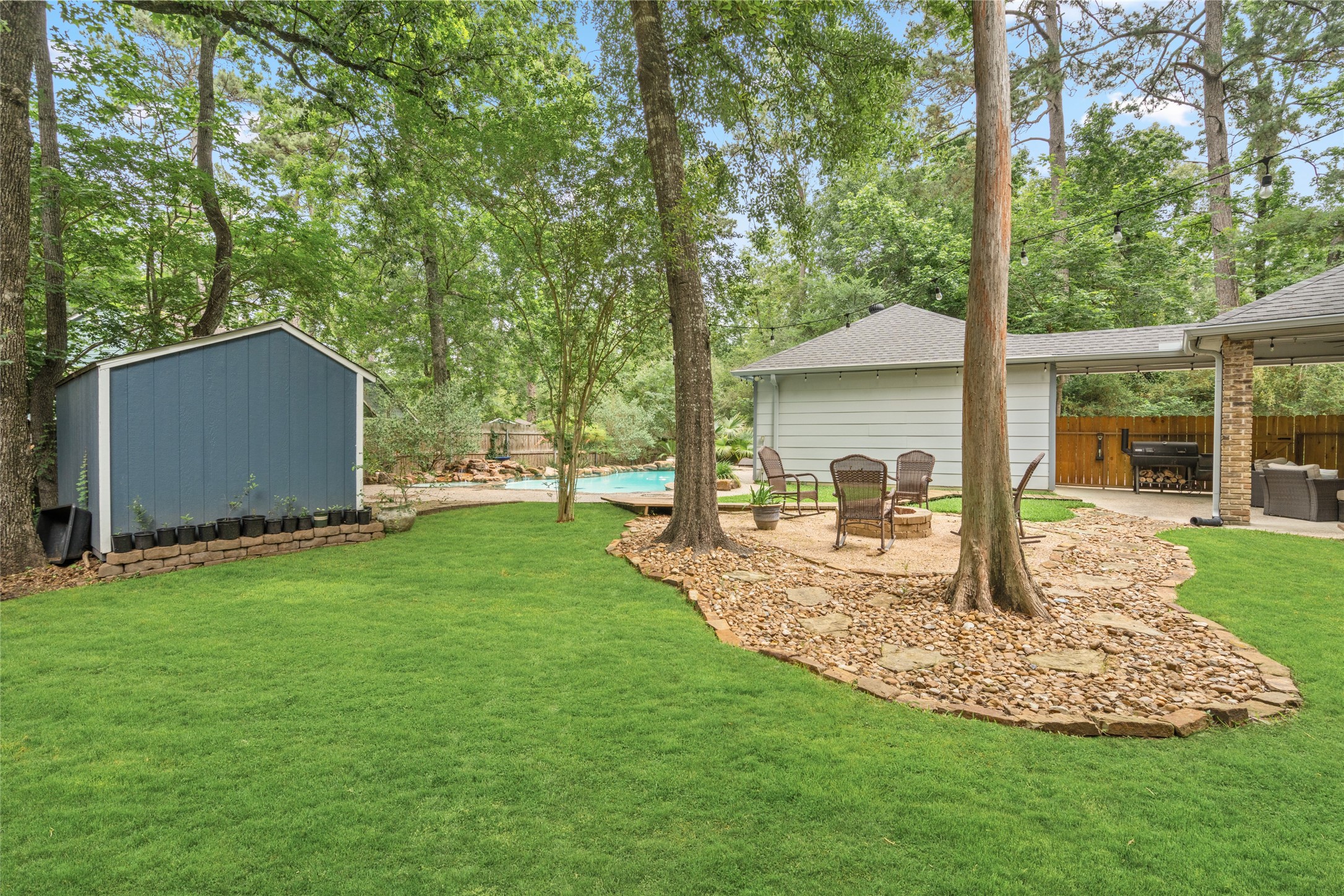 77 South Placid Hill Circle Spring, TX 77381 - Photo 40 of 48 Expansive green space offers plenty of room to play or relax while surrounded by towering trees for added privacy and shade.