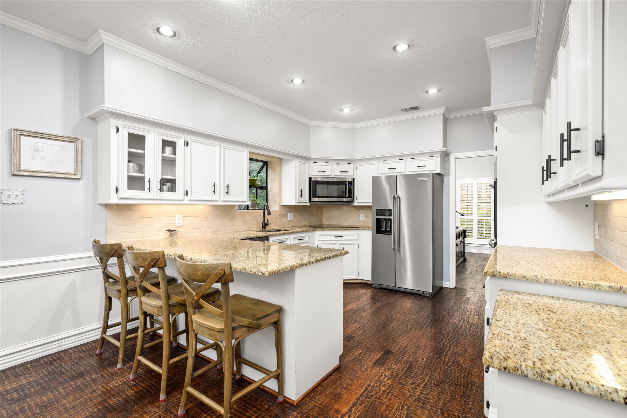77 South Placid Hill Circle Spring, TX 77381 - Photo 6 of 48 Updated kitchen with stainless steel appliances and granite countertops.