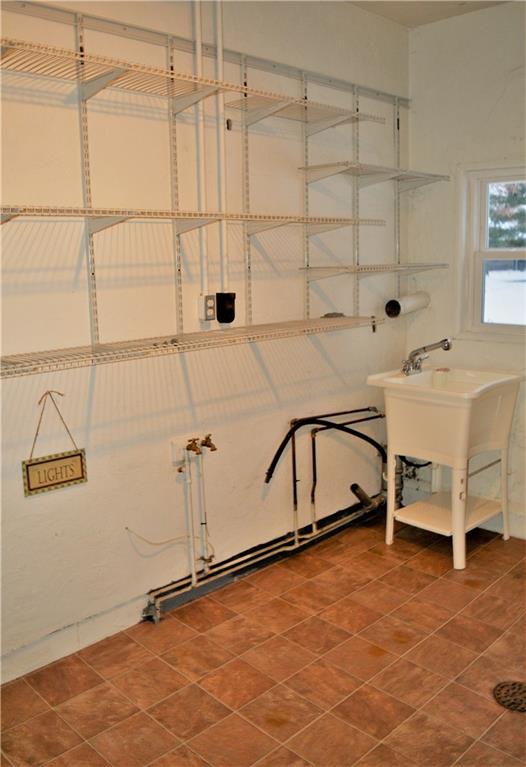 456 South Eberhart Road Butler, PA 16001 - Photo 18 of 25 Laundry and Utility Room with Door to Back Yard