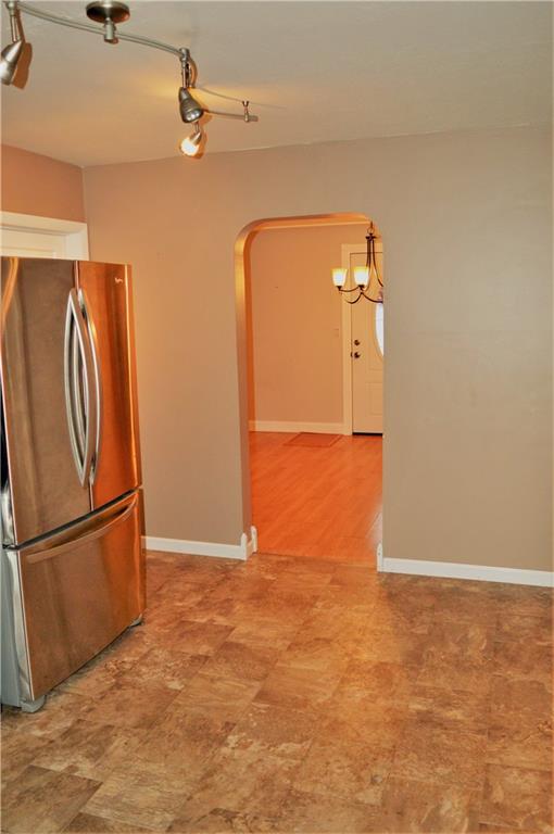 456 South Eberhart Road Butler, PA 16001 - Photo 5 of 25 Kitchen view to Dining Room/Living Room Combo and Door to Laundry/utility Room