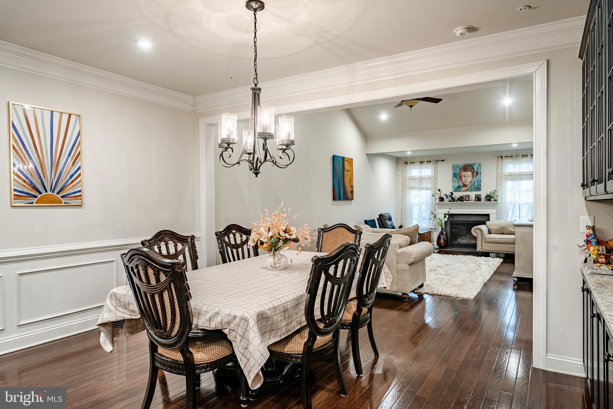 416 Patriots Path Malvern, PA 19355 - Photo 13 of 37 a view of a dining room with furniture wooden floor and chandelier