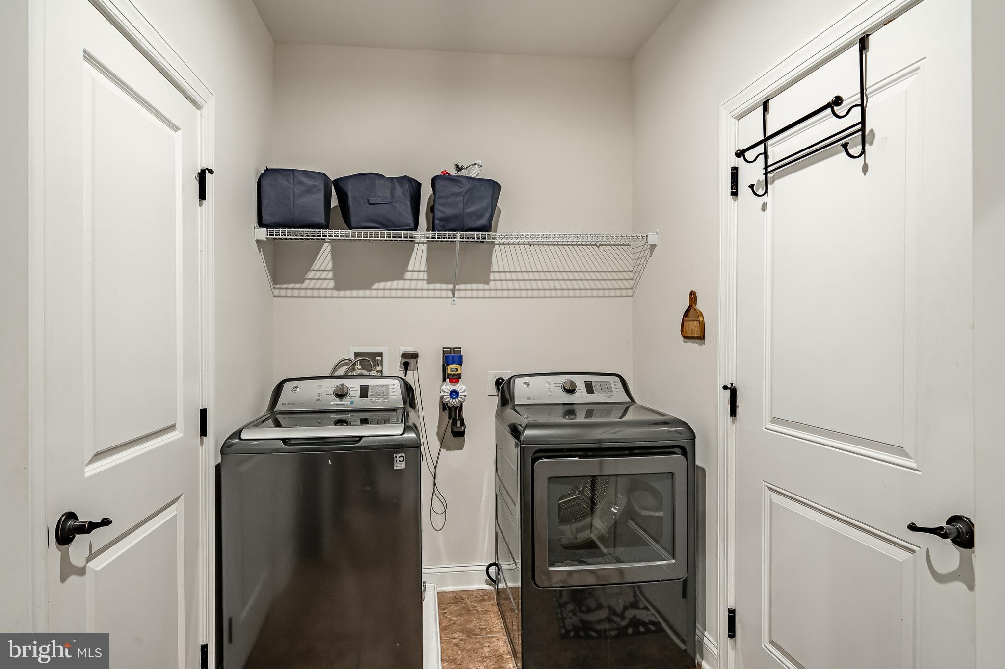 416 Patriots Path Malvern, PA 19355 - Photo 14 of 37 a utility room with dryer and washer