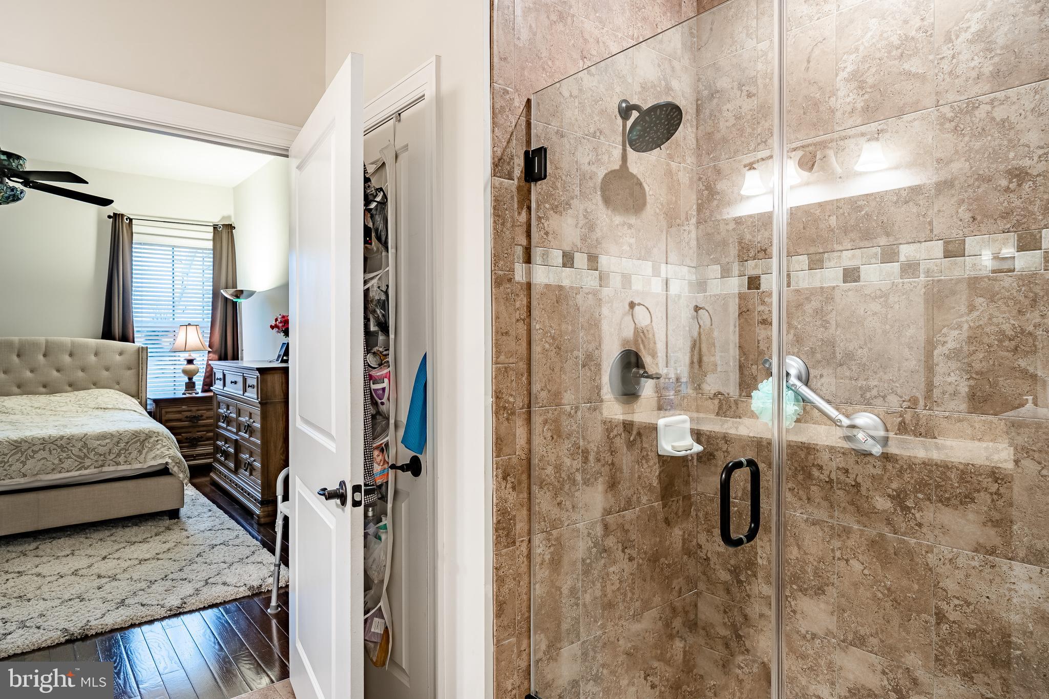 416 Patriots Path Malvern, PA 19355 - Photo 19 of 37 a bathroom with a granite countertop shower and a sink