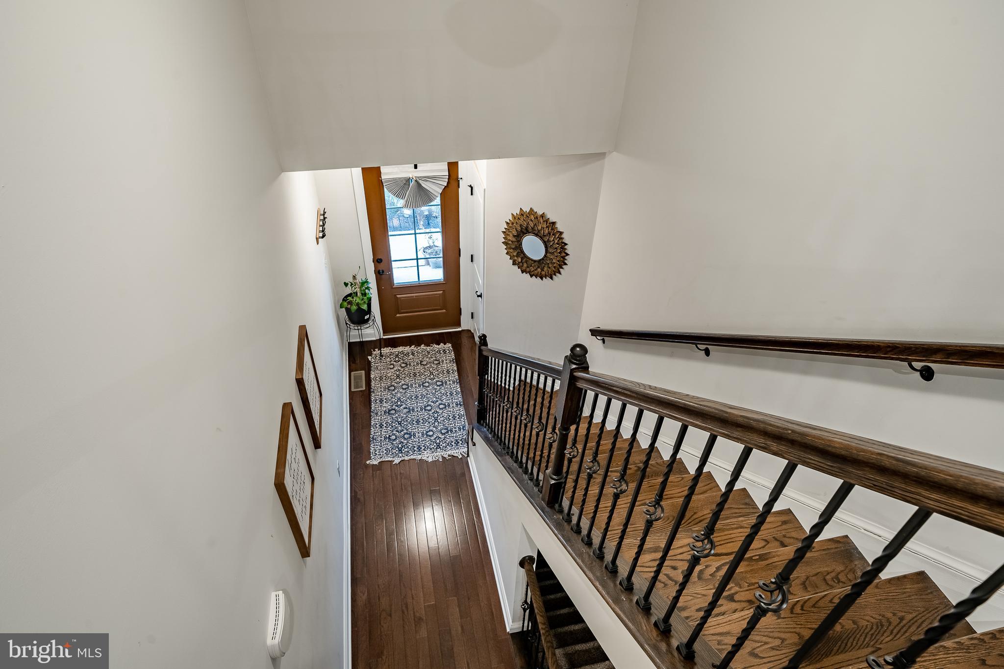 416 Patriots Path Malvern, PA 19355 - Photo 23 of 37 a view of a hallway with wooden floor