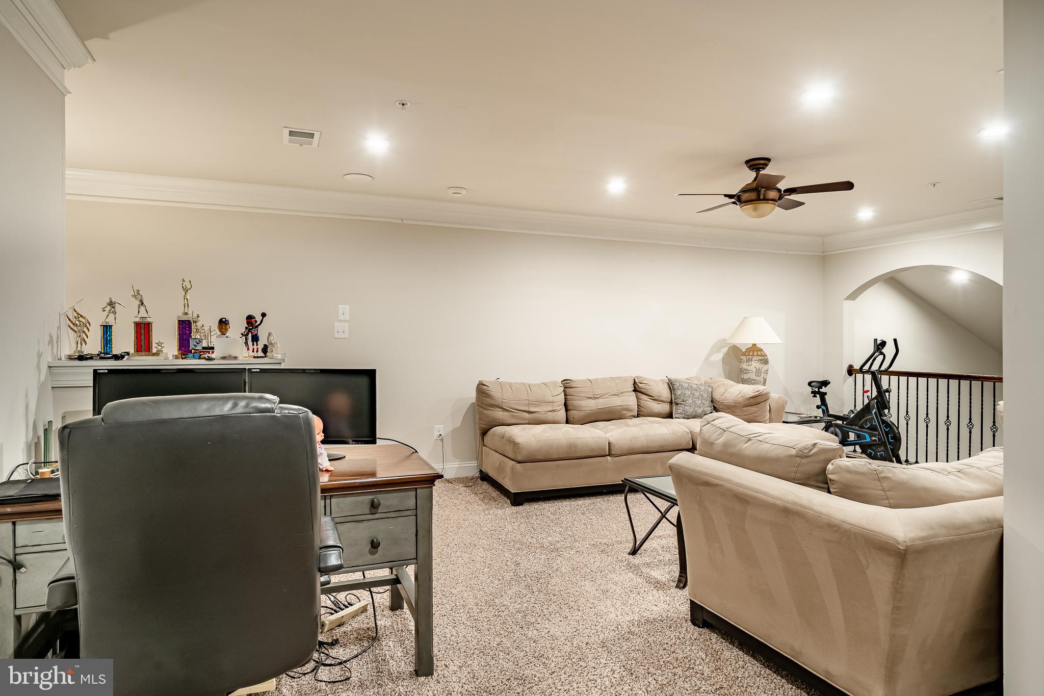 416 Patriots Path Malvern, PA 19355 - Photo 27 of 37 a living room with furniture and a ceiling fan