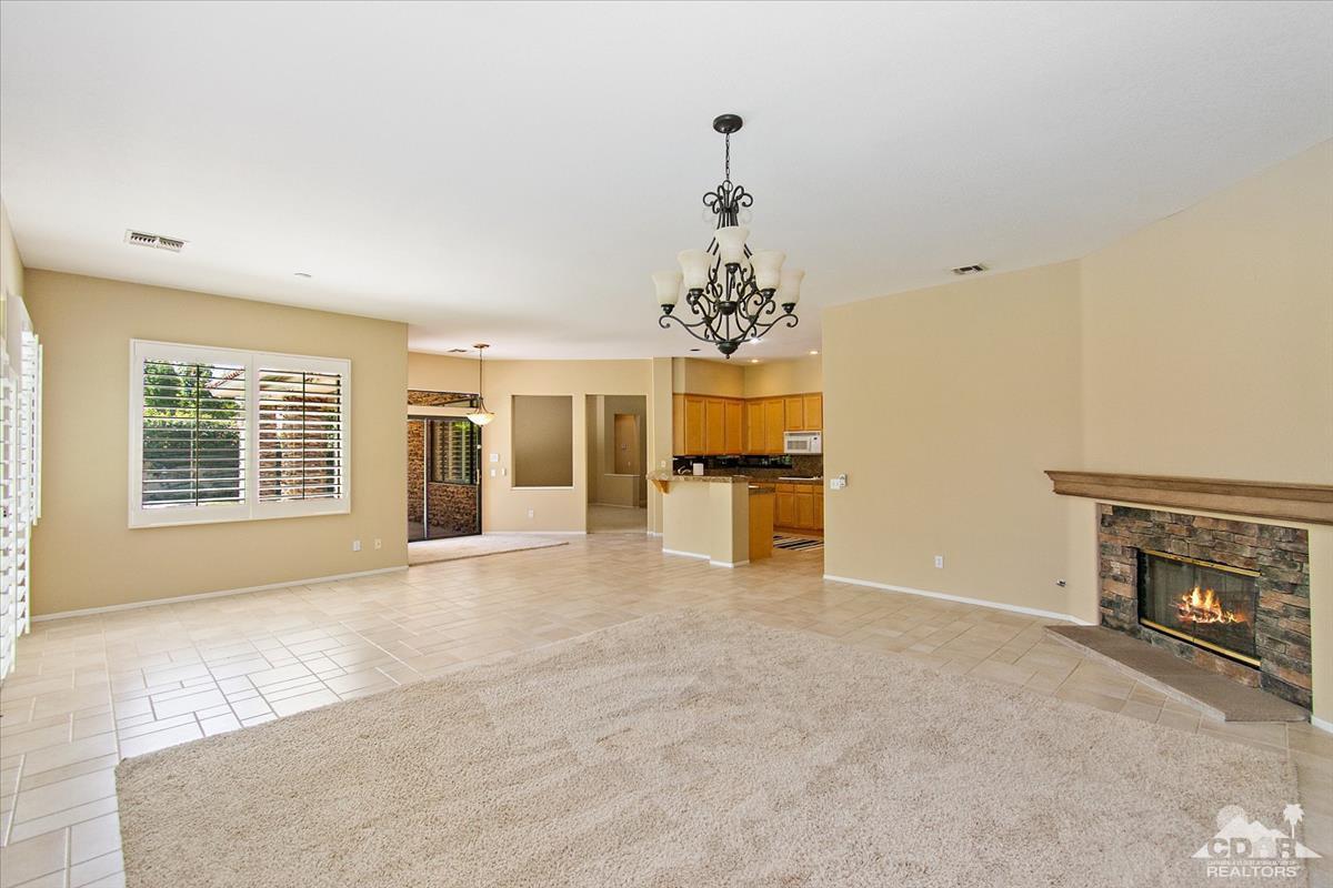 38 Santa Ynez Rancho Mirage, CA 92270 - Photo 15 of 38 a view of livingroom with a fireplace