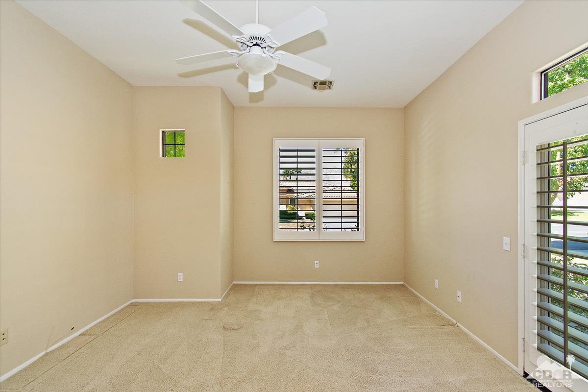 38 Santa Ynez Rancho Mirage, CA 92270 - Photo 25 of 38 an empty room with windows and fan