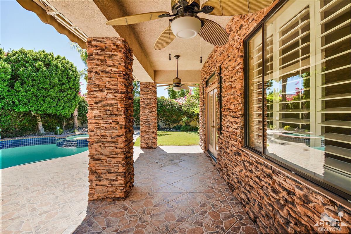 38 Santa Ynez Rancho Mirage, CA 92270 - Photo 28 of 38 a view of a brick house with a large windows
