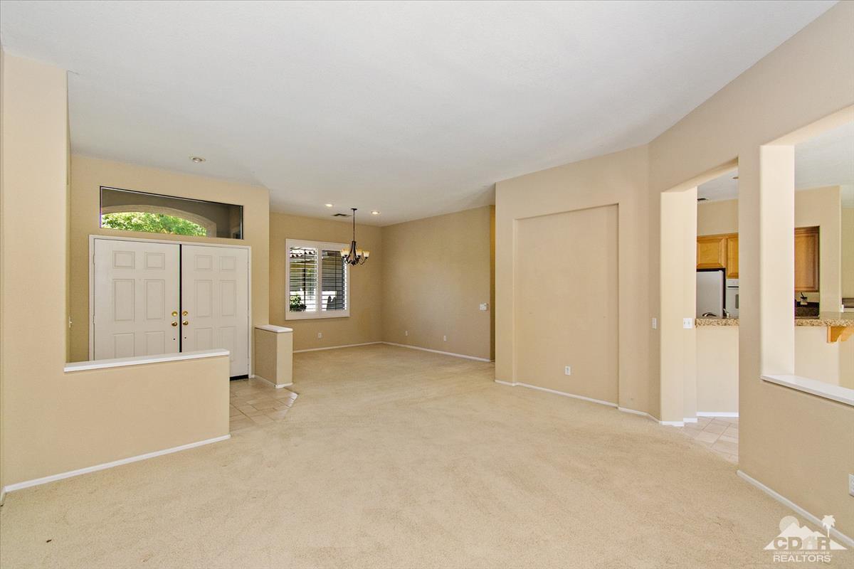 38 Santa Ynez Rancho Mirage, CA 92270 - Photo 9 of 38 an empty room with windows and entrance