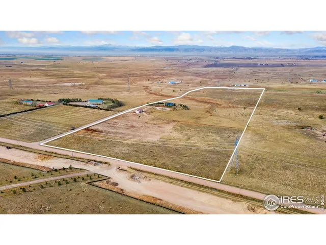 a view of an ocean and mountain
