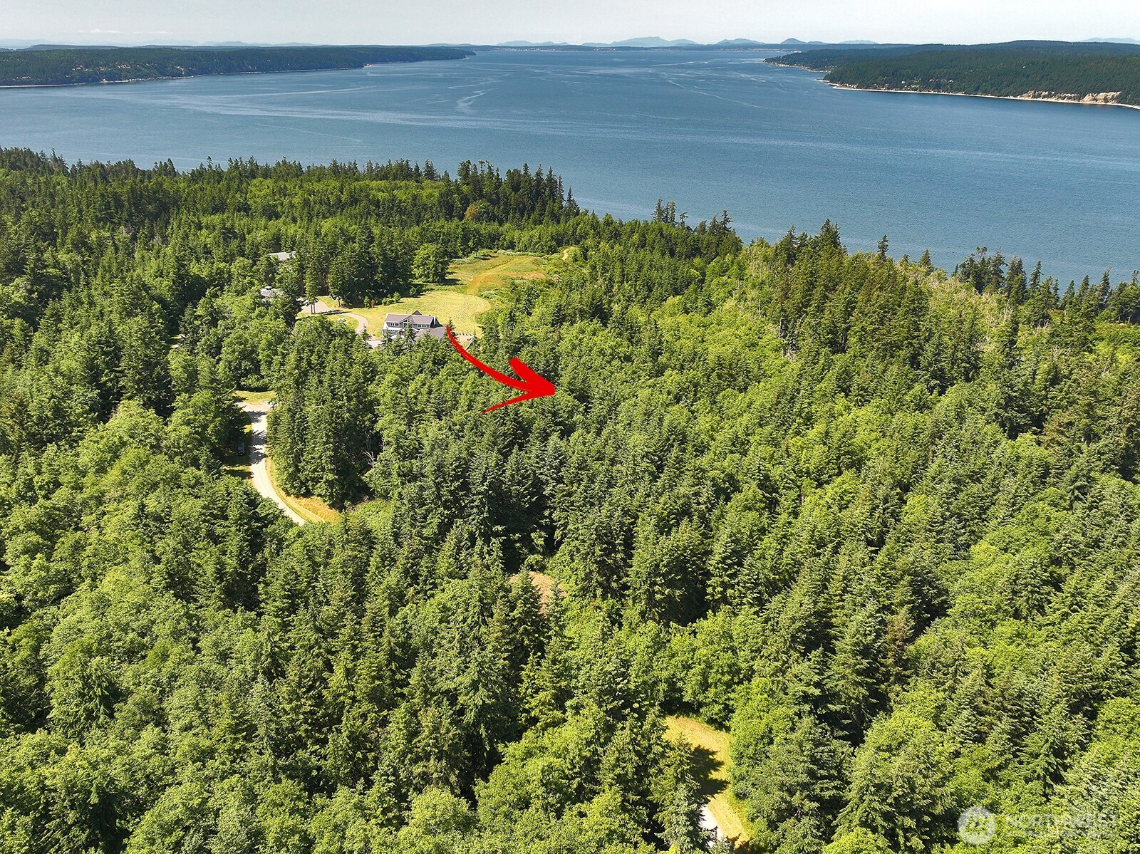 -xxx Xxx Saratoga Ridge Road Langley, WA 98260 - Photo 15 of 24 a view of a lake