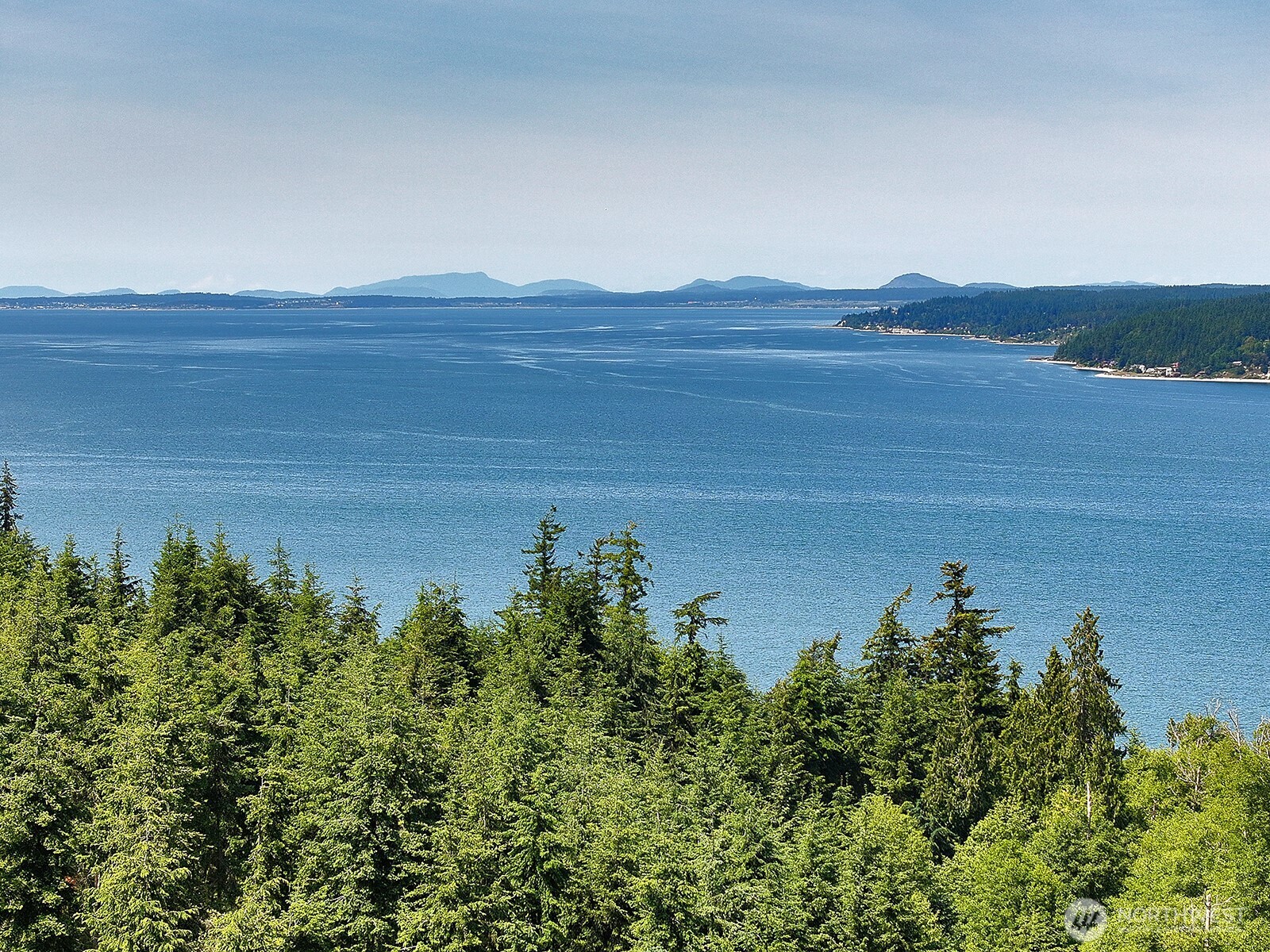 -xxx Xxx Saratoga Ridge Road Langley, WA 98260 - Photo 7 of 24 a view of a lake