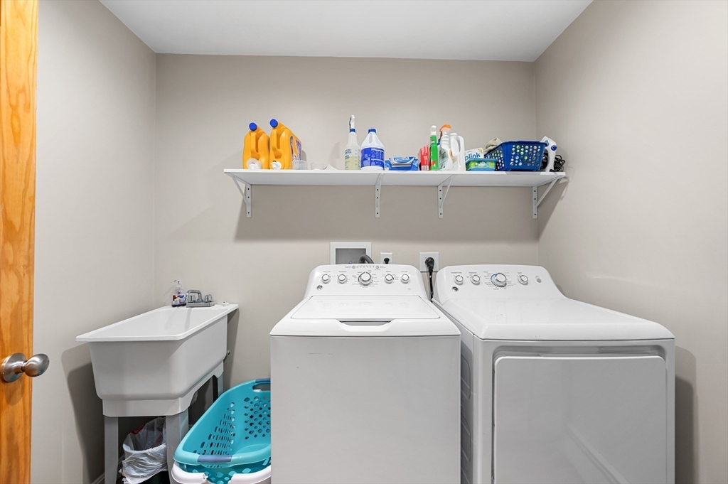 27 Downey Street Hopkinton, MA 01748 - Photo 22 of 36 a utility room with dryer and washer