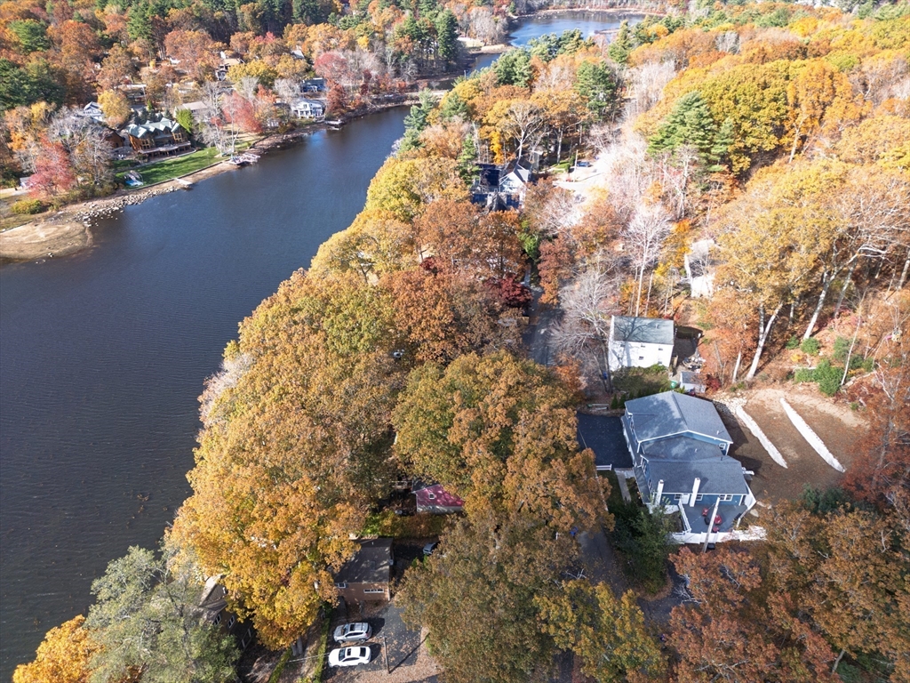 27 Downey Street Hopkinton, MA 01748 - Photo 34 of 36 a aerial view of house with yard and mountain view in background