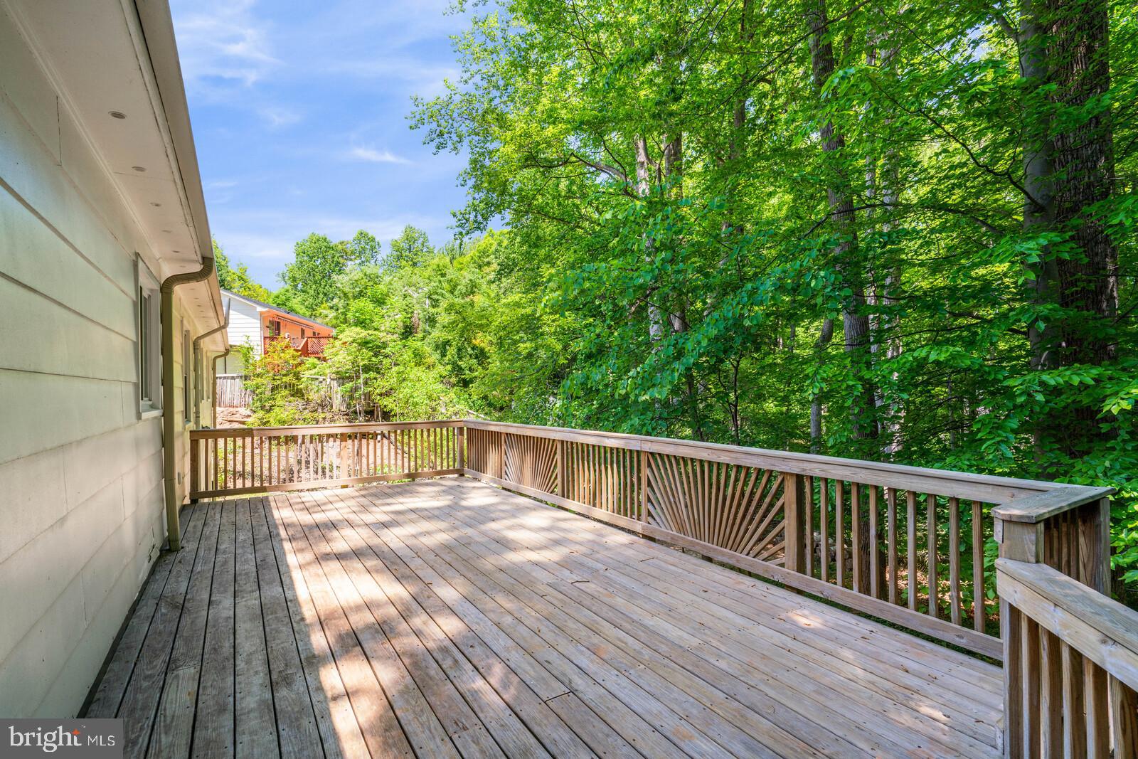 6580 Davis Ford Road Manassas, VA 20111 - Photo 36 of 38 Deck that looks out into the mature trees.
