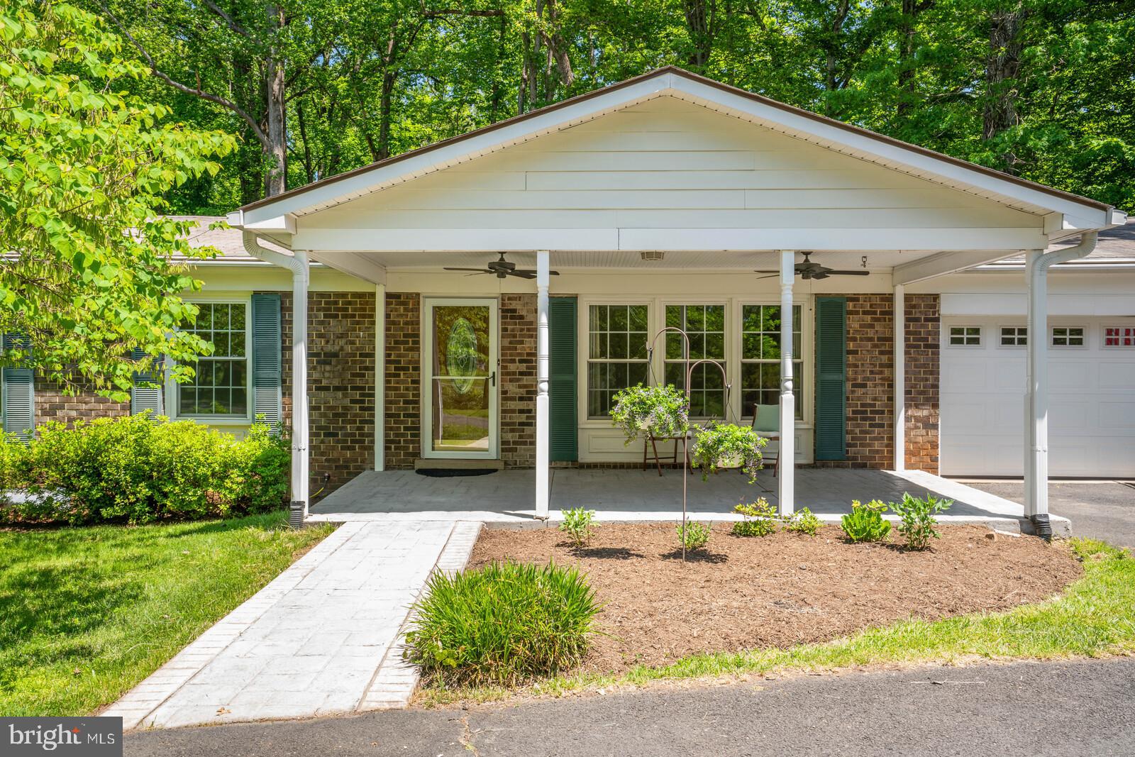 6580 Davis Ford Road Manassas, VA 20111 - Photo 5 of 38 Covered porch w/ new ceiling fans to enjoy summer!