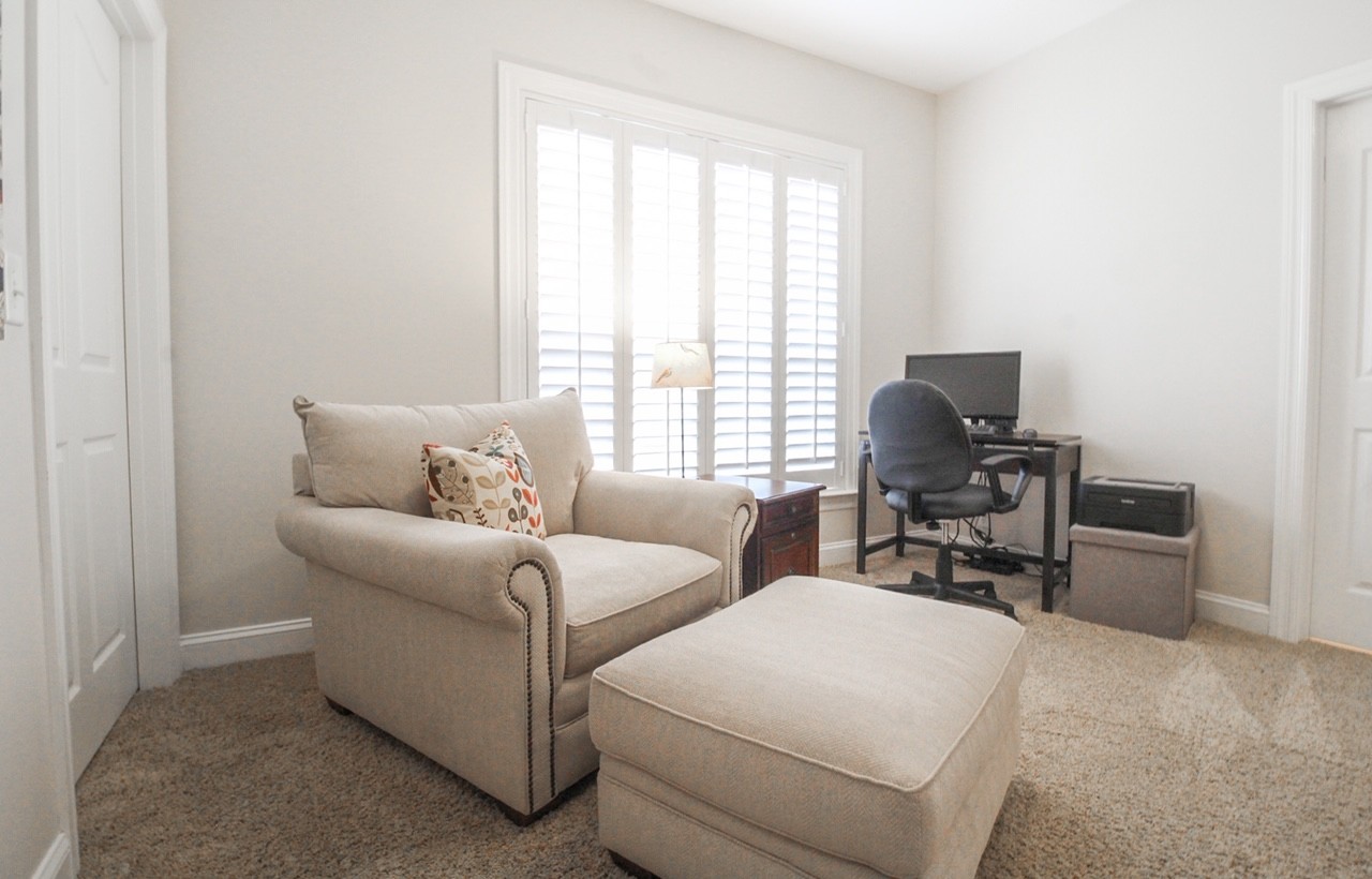 4840 Redcastle Ridge Nashville, TN 37211 - Photo 14 of 37 a living room with furniture a computer on the desk and a window