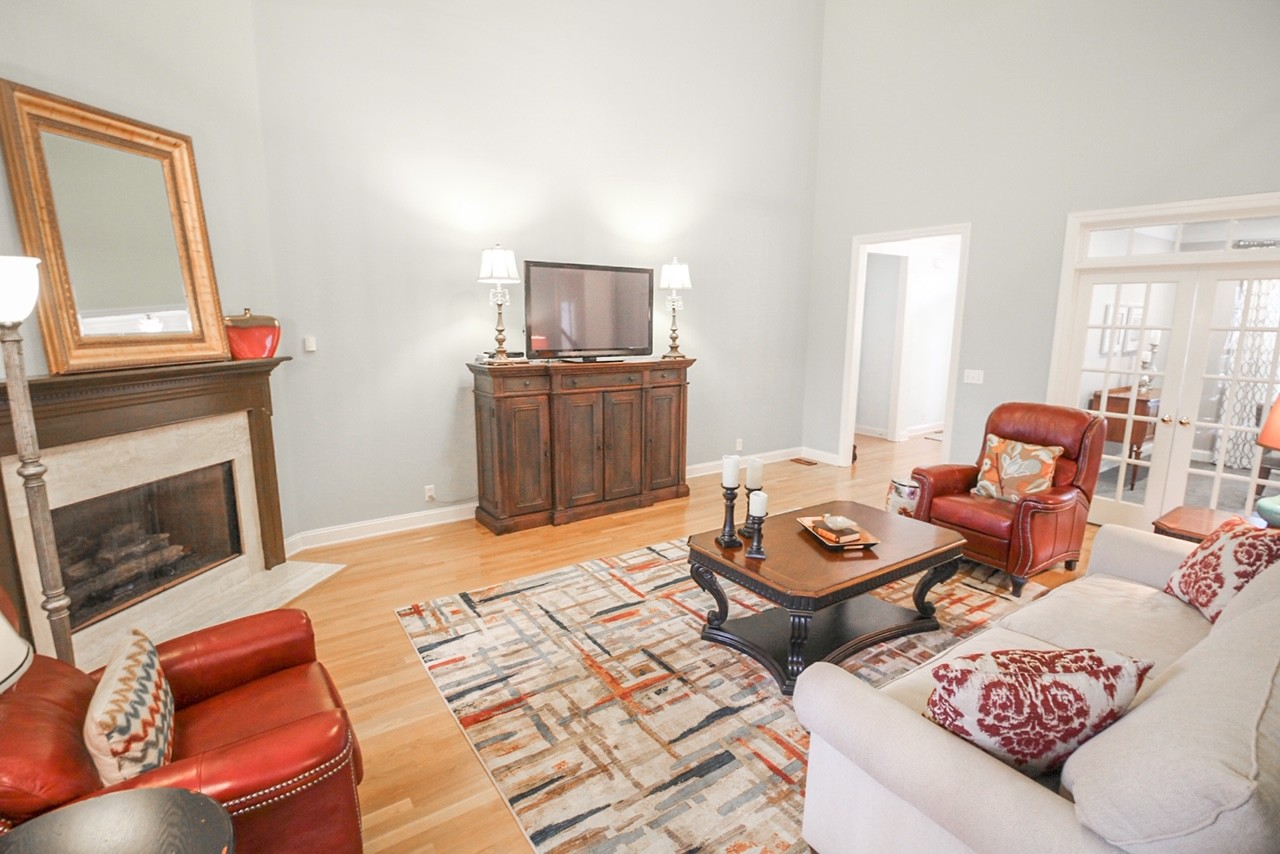 4840 Redcastle Ridge Nashville, TN 37211 - Photo 16 of 37 a living room with furniture and a fireplace