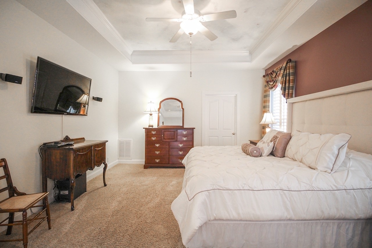 4840 Redcastle Ridge Nashville, TN 37211 - Photo 21 of 37 a bedroom with a bed and a flat screen tv