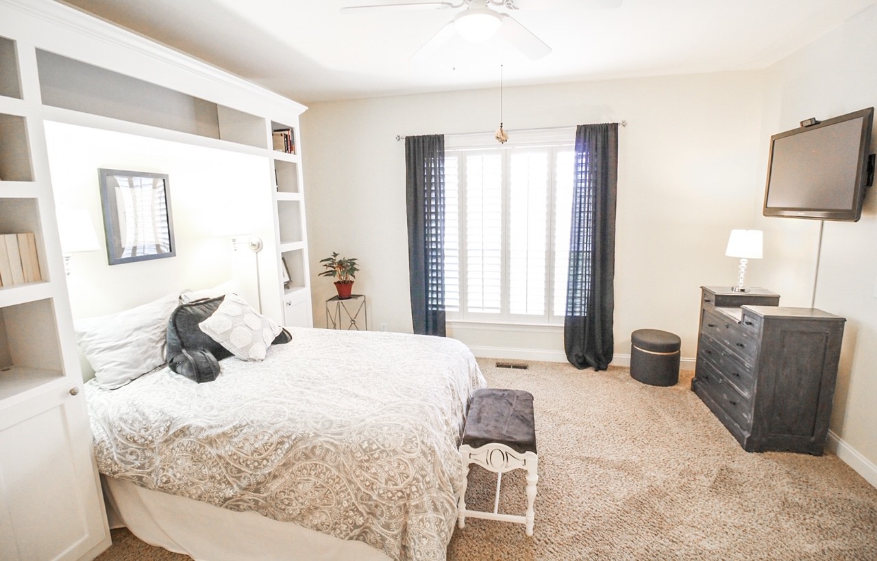 4840 Redcastle Ridge Nashville, TN 37211 - Photo 22 of 37 a bedroom with a bed and wooden floor