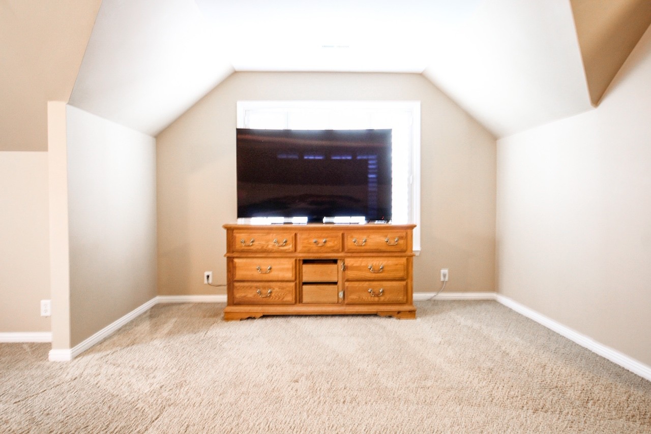 4840 Redcastle Ridge Nashville, TN 37211 - Photo 27 of 37 a room with furniture and flat screen tv