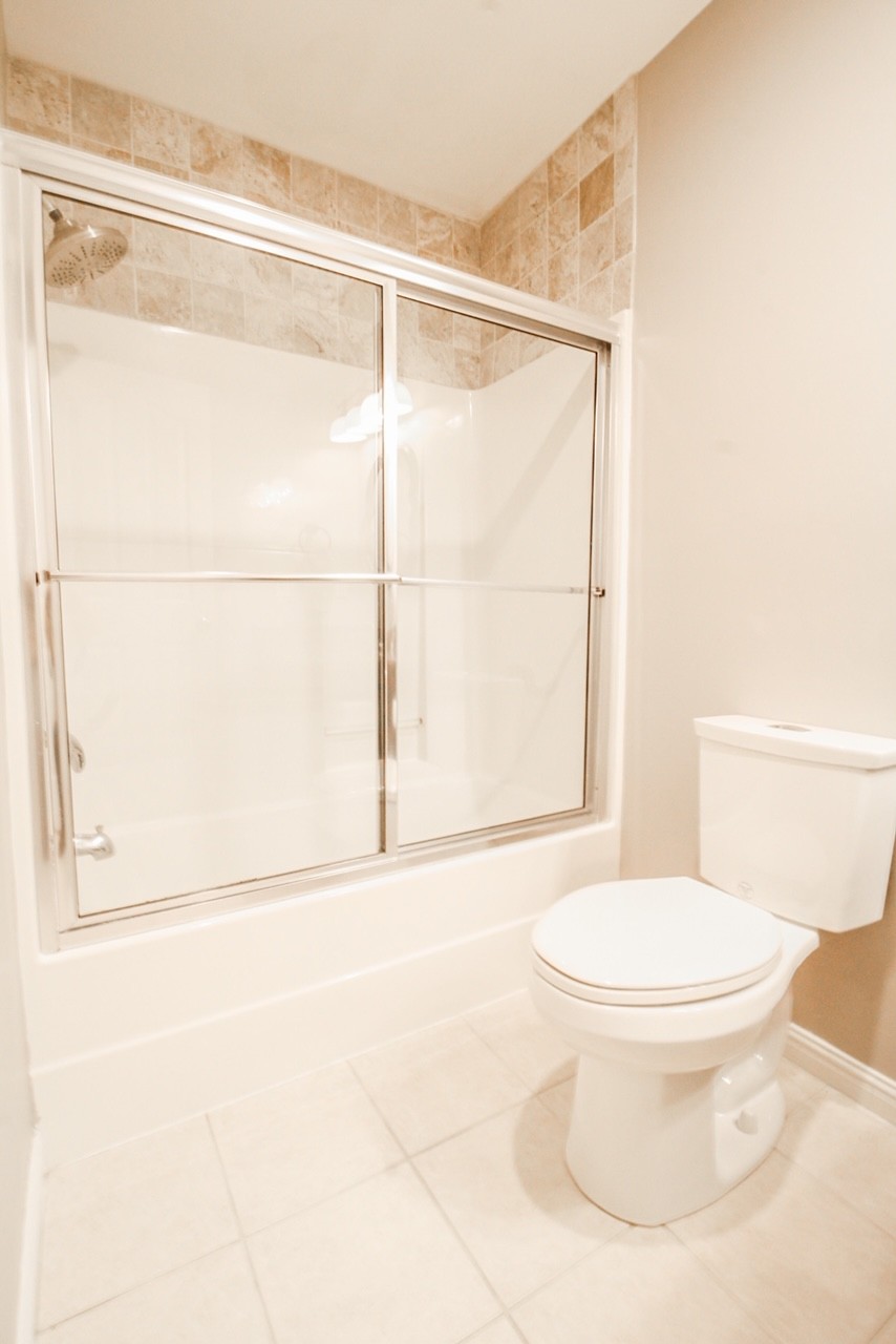4840 Redcastle Ridge Nashville, TN 37211 - Photo 28 of 37 a white toilet sitting next to a bathroom sink