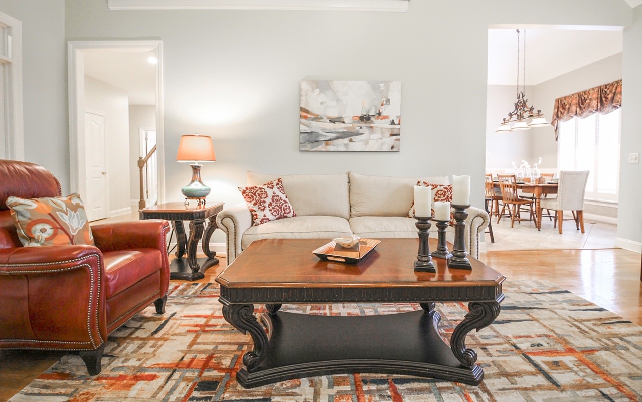 4840 Redcastle Ridge Nashville, TN 37211 - Photo 5 of 37 a living room with furniture a rug and a table