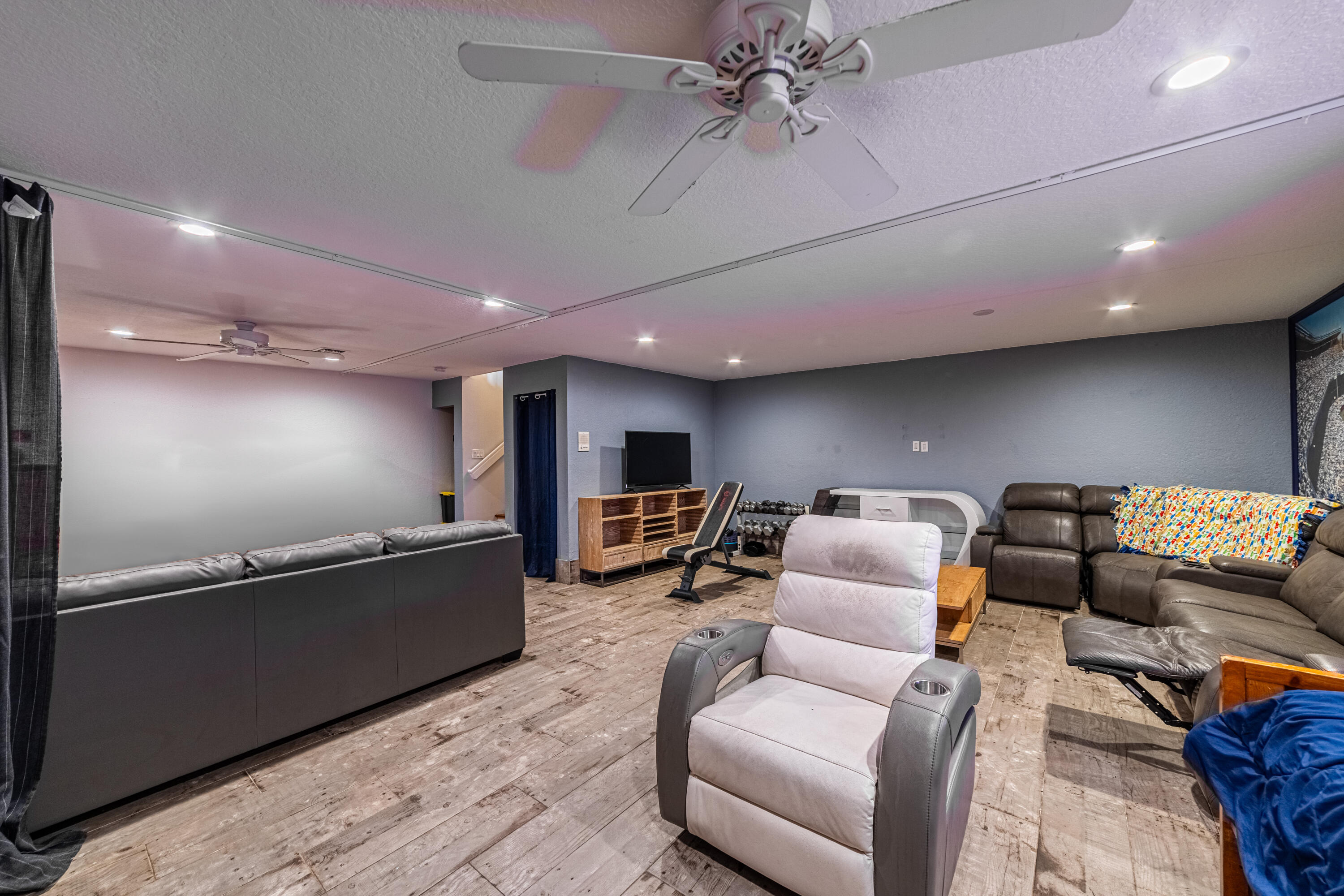 136 Spruce Street Boynton Beach, FL 33426 - Photo 11 of 24 a living room with furniture and a flat screen tv