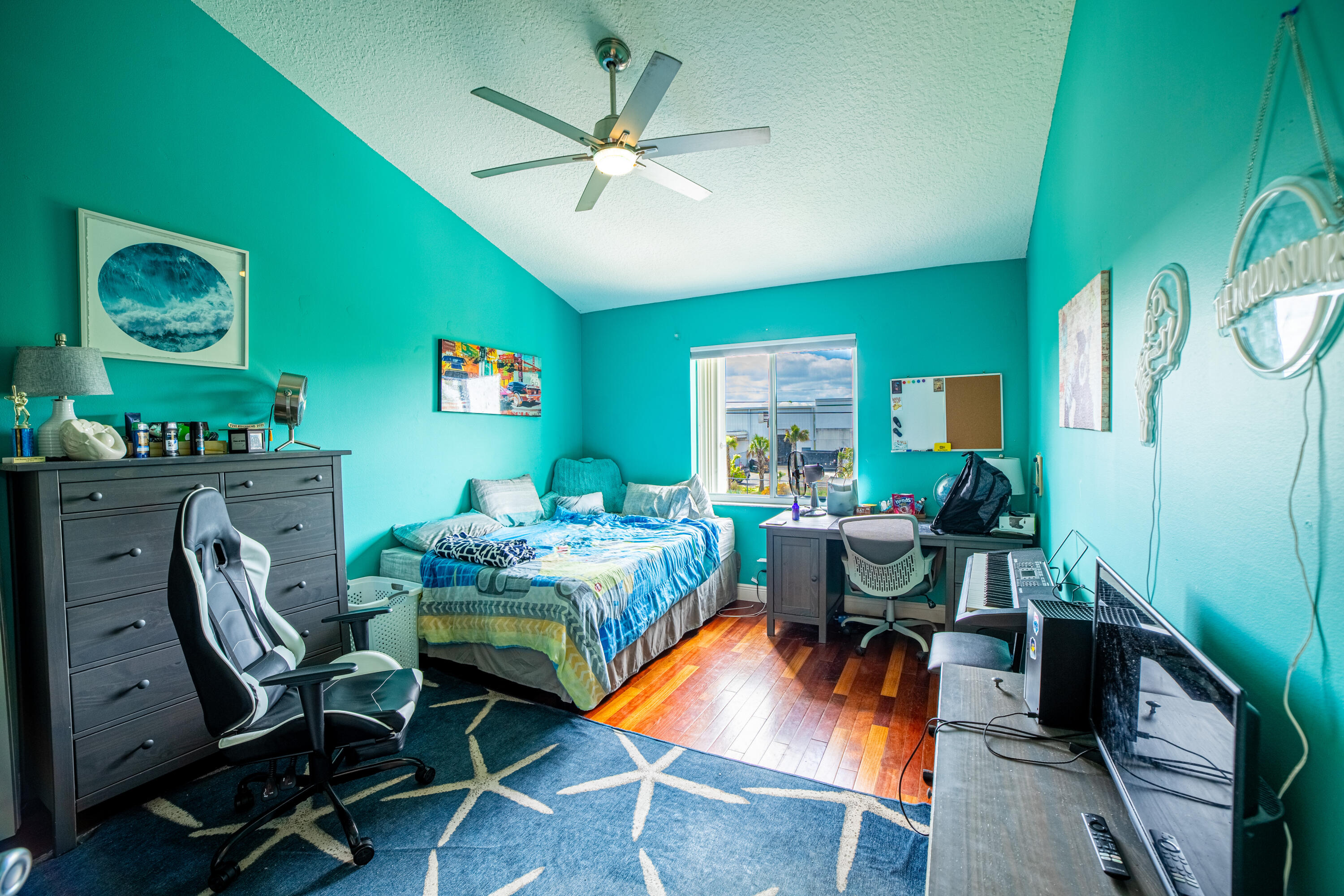 136 Spruce Street Boynton Beach, FL 33426 - Photo 14 of 24 a bedroom with furniture and a window