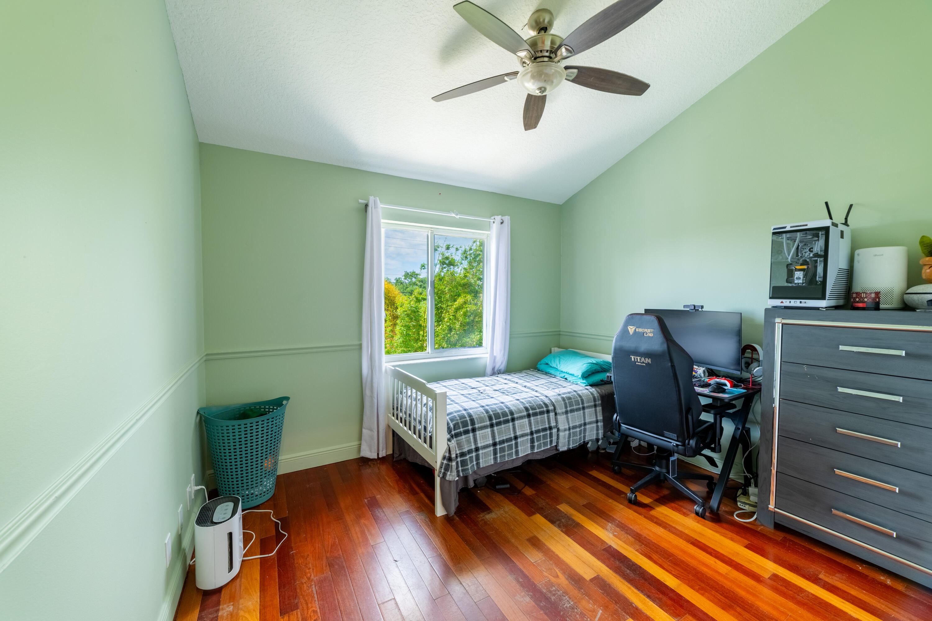 136 Spruce Street Boynton Beach, FL 33426 - Photo 15 of 24 a living room with furniture and a wooden floor