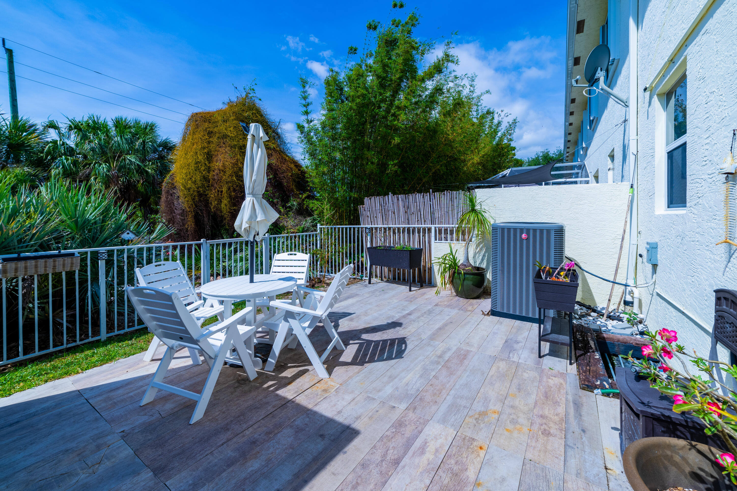 136 Spruce Street Boynton Beach, FL 33426 - Photo 21 of 24 a view of a chairs and table in the balcony
