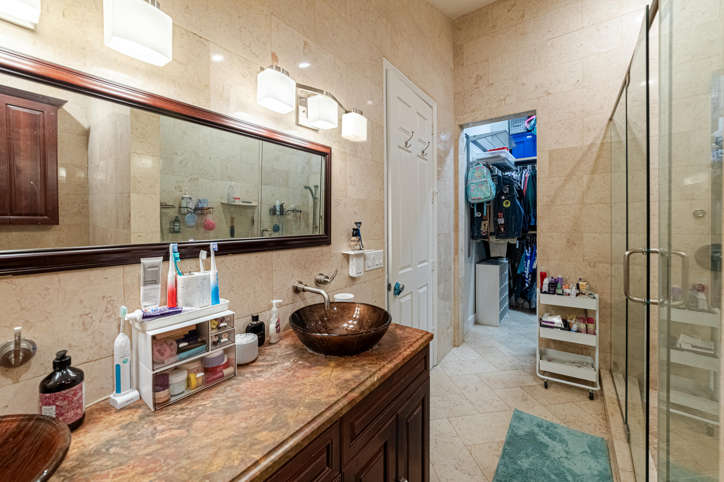 136 Spruce Street Boynton Beach, FL 33426 - Photo 7 of 24 a kitchen with stainless steel appliances granite countertop a stove and a refrigerator