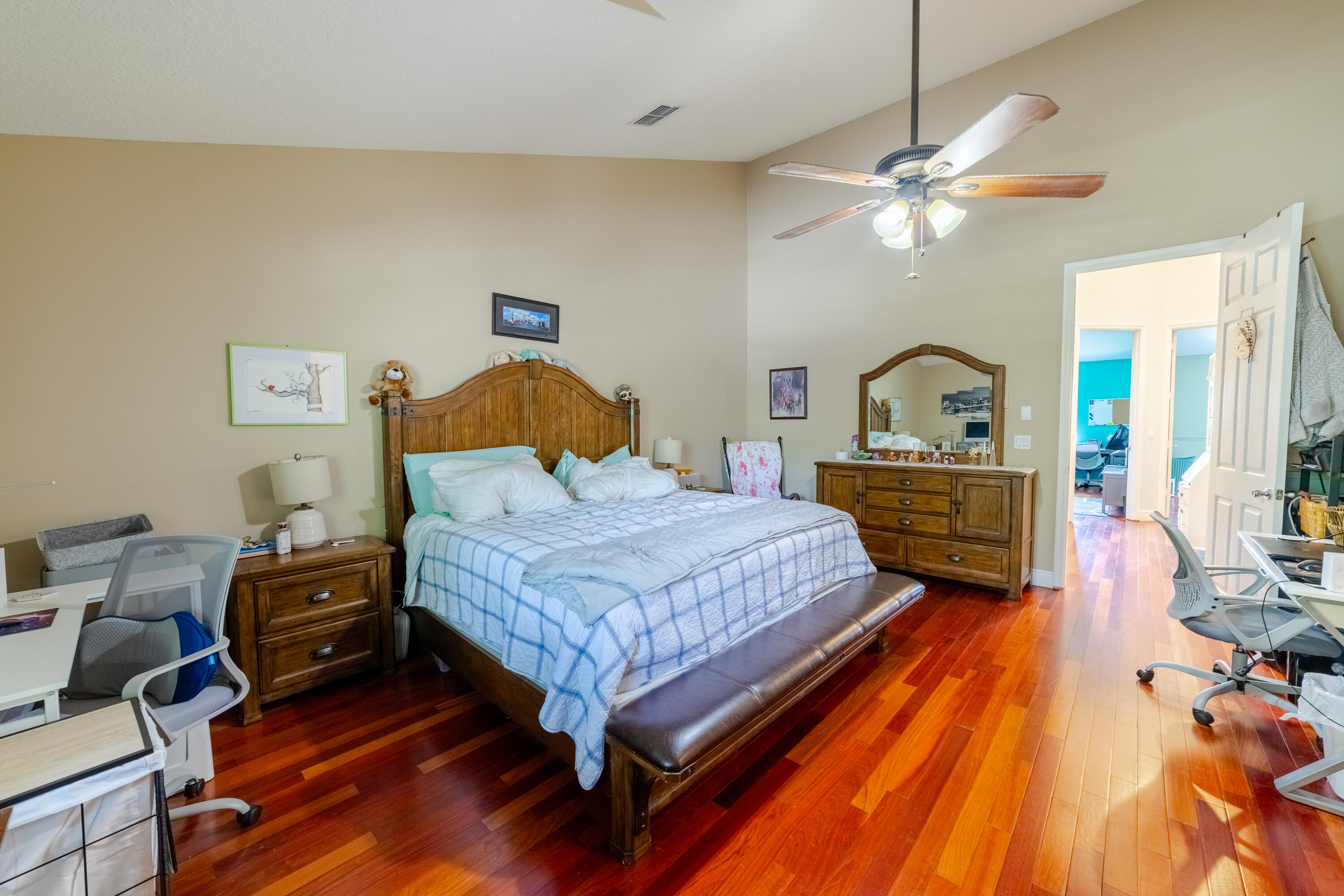 136 Spruce Street Boynton Beach, FL 33426 - Photo 9 of 24 a bedroom with a bed and wooden floor