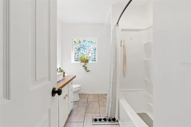 a bathroom with a bathtub