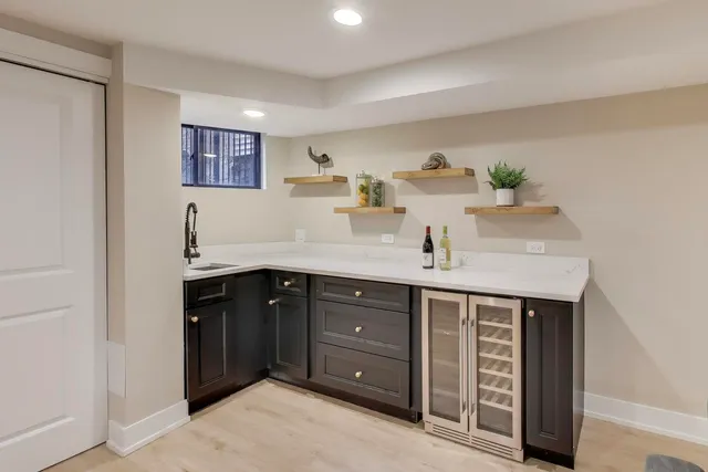 a kitchen with a sink and cabinets