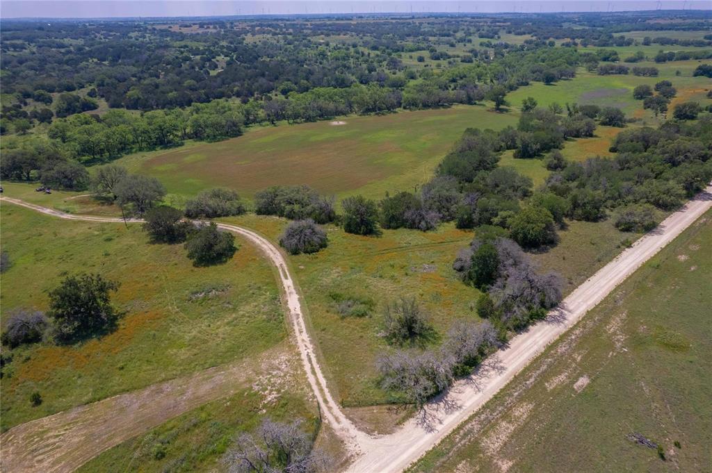 180 County Road 140 Comanche, TX 76442 - Photo 2 of 17 a view of a lake with a mountain