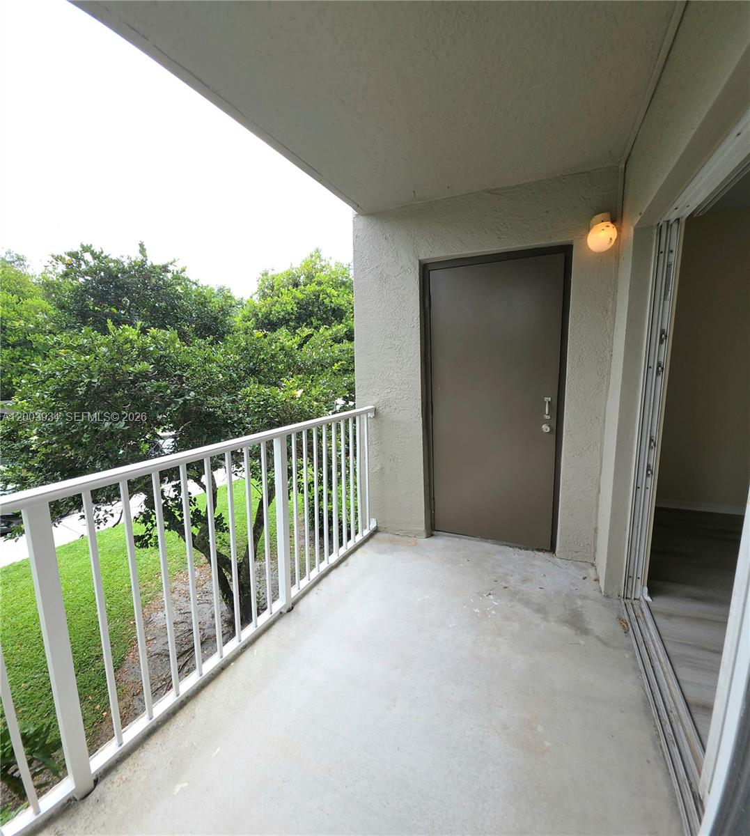 5051 Wiles Road, Unit 201 Coconut Creek, FL 33073 - Photo 30 of 43 a view of balcony