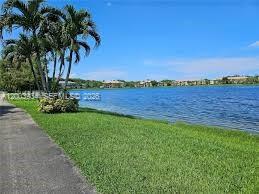 5051 Wiles Road, Unit 201 Coconut Creek, FL 33073 - Photo 35 of 43 a view of an outdoor space