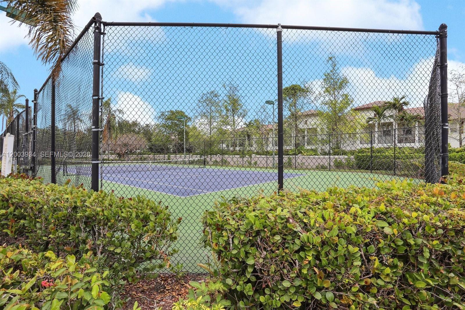 5051 Wiles Road, Unit 201 Coconut Creek, FL 33073 - Photo 40 of 43 a view of a garden