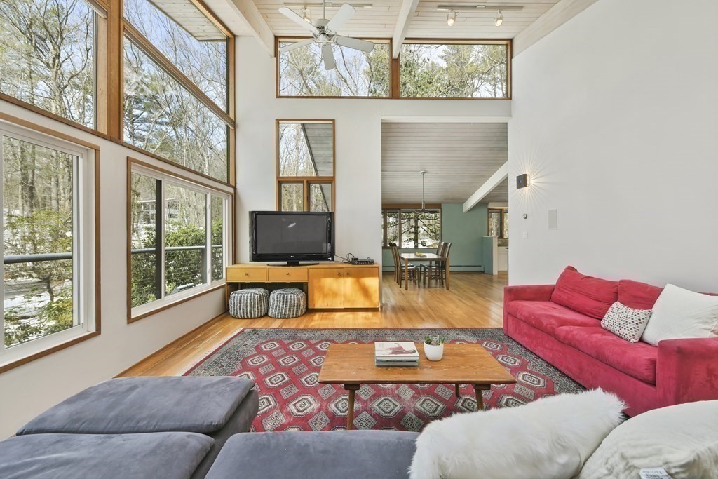 87 Wolf Rock Road Carlisle, MA 01741 - Photo 14 of 28 a bedroom with furniture and a window