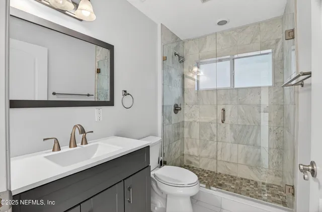 a view of a house with swimming pool and a yard