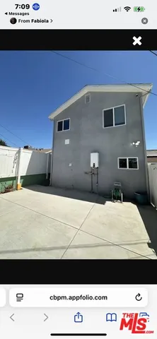 a black and white photo of a bed