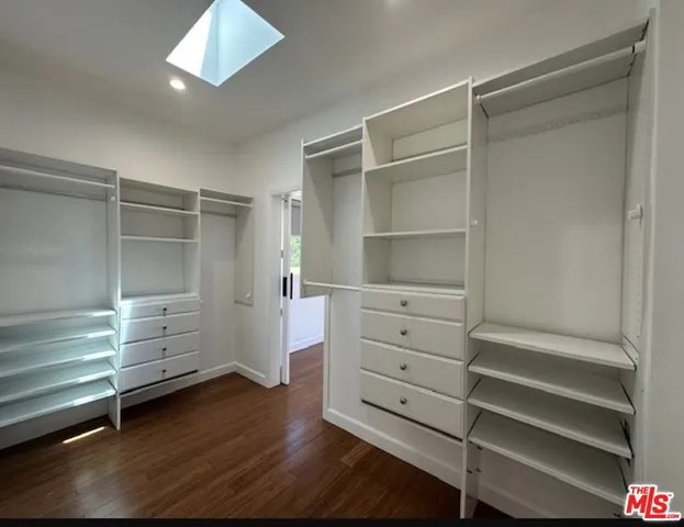 a view of a balcony with chairs