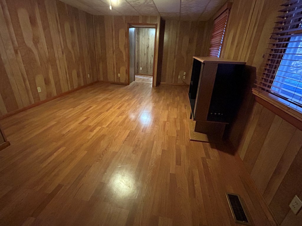 939 Watson Road Titusville, PA 16354 - Photo 12 of 39 a view of a hallway with wooden floor