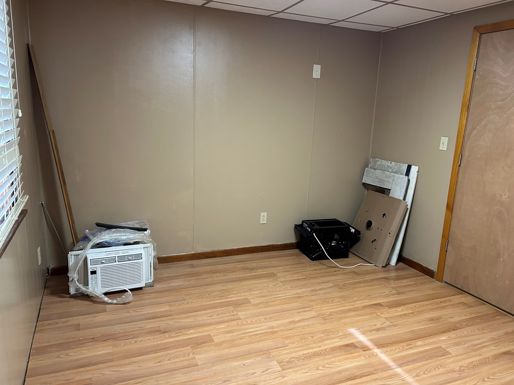 939 Watson Road Titusville, PA 16354 - Photo 18 of 39 a room with a window and wooden floor